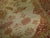 A connoisseur caliber early 20th century room size Persian Sultanabad carpet with red and orange accents on an ivory field...