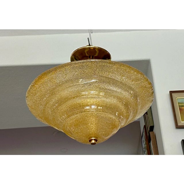 Murano Italian round gold colored handblown reeded glass semi-flush mount ceiling light. Done in the Rugiadoso...