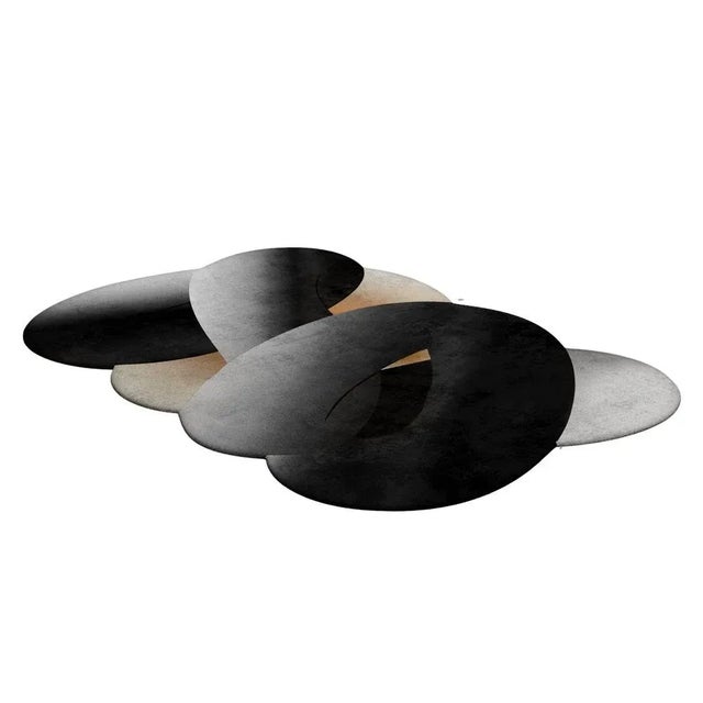 Tapis Shaped #001 is an eclectic rug that brings back mid-century modern vibes. Our Shaped Collection is perfect for an...