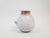 About this item White ceramic vase by Mobach Keramiek with two ears. Marked at the bottom This piece is attributed to the...