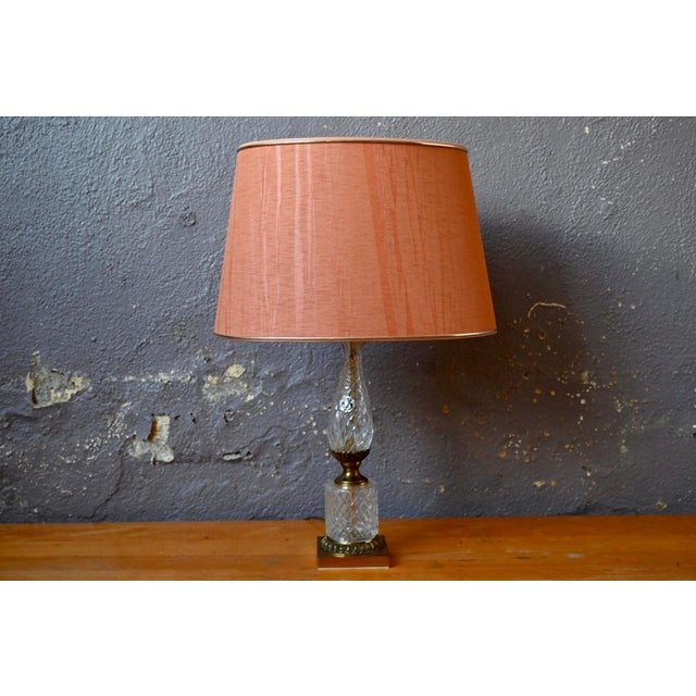 Be captivated by the timeless elegance of this magnificent vintage table lamp! with its distinctly Hollywood Regency...