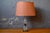 Be captivated by the timeless elegance of this magnificent vintage table lamp! with its distinctly Hollywood Regency...