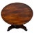 A charming 19th-century English side table, finely crafted from mahogany and distinguished by its elegant circular top,...