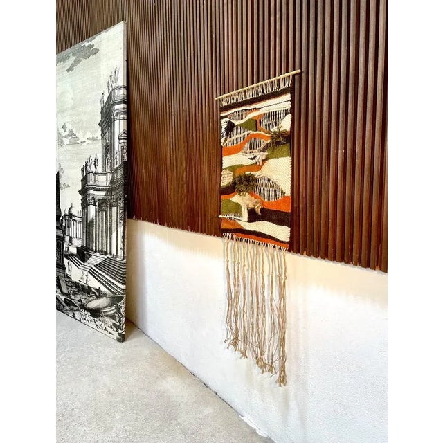 This fine tapestry art wall hanging was hand-woven in Spain during the 1960s by an unknown artist. The piece features an...