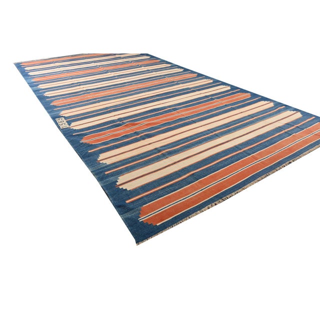 This vintage 10x13 Dhurrie is an exciting new entry in Rug & Kilim's esteemed flat weave collection. Handwoven in cotton,...