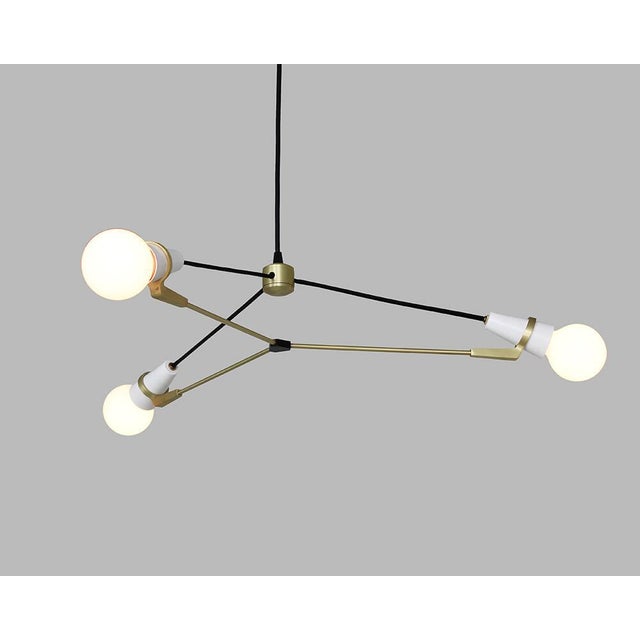 The Ravenhill Studio Church 3 Arm Pendant Light is a sculptural modern fixture designed as an elegant lighting solution...