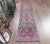 Vintage Turkish Hand-Knotted Hallway Runner Rug is a semi-Vintage rug. '80s Eastern region of Turkey's unique rug is...