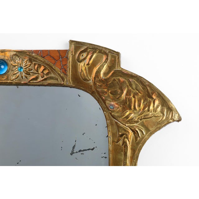 France / 1910 / mirror / signed a.h. Villaket / brass, wood, and glass / art nouveau a rare and lyrical embodiment of...