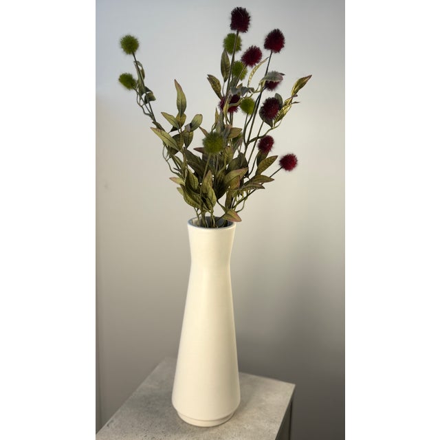 This tall, slender ceramic vase was created in the 1960s based on a design by Jan Bontjes van Beek and produced by the...