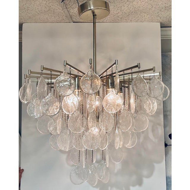 Original retail $1764, stylish Modern Seeded Glass Goccia Pendant Light, silver frame, showroom floor sample