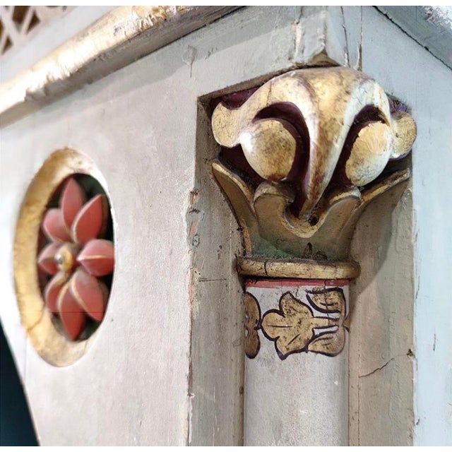 A pair of 19th-century neo-Gothic niches, lacquered and painted with polychrome colors and gold decorations. The...