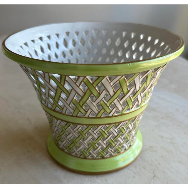 Vintage reticulated green and white cache pot made in Italy and purchased at a high-end interior decor store, Cannell &...