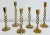 Vintage set of six (6) brass barley twist candlesticks of varying heights and design. Tallest 9.5"H, shortest 7.5"H. This...
