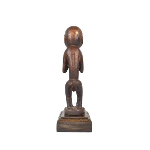 This figure comes from the culturally dynamic northwestern region of the Democratic Republic of the Congo along the river...