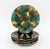 Wedgwood Shell-Form Centerpiece and Five Plates, each with green and brown glaze, marked "Wedgwood" underside....