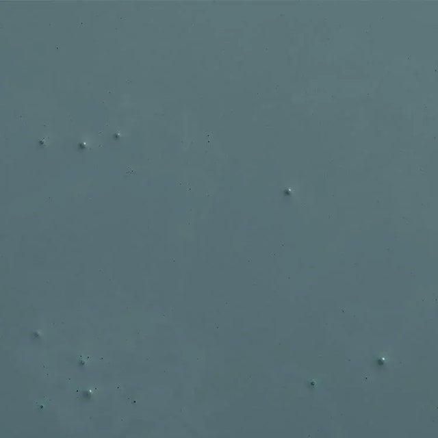 Dark blue-gray with a hint of green undertones. Depending the light, this color can skew blue or green. Our large 12"x12''...