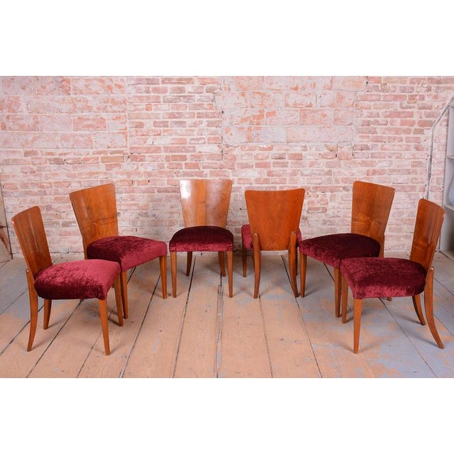 This elegant and characteristically shaped set of six Art Deco chairs dates from the 1940s in Czechoslovakia and bears the...