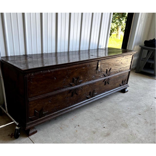 An extraordinary statement piece - a 77-inch hand-built plank coffer in the Spanish / Mudejar taste, with applied eight-...