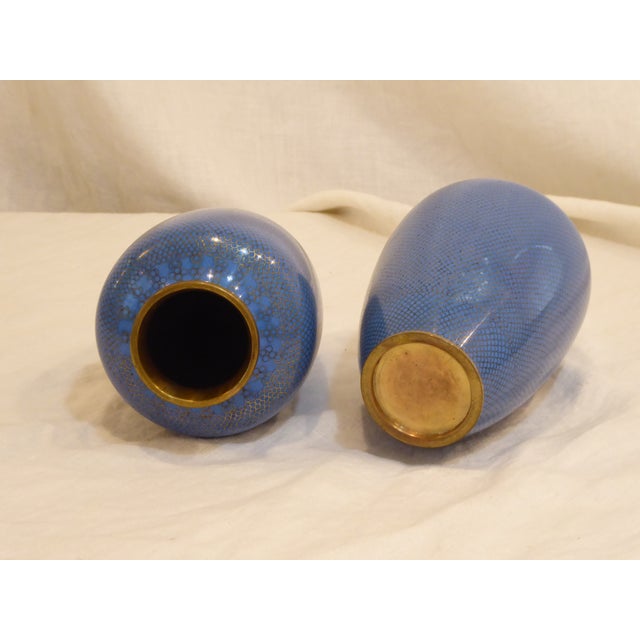 This pair of cerulean blue cloisonne vases are 9"H.