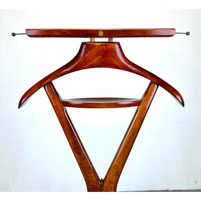 A gorgeous and sculptural men’s valet designed by Ico and Luisa Parisi circa 1960’s for Fratelli Reguitti, Italy. Features...