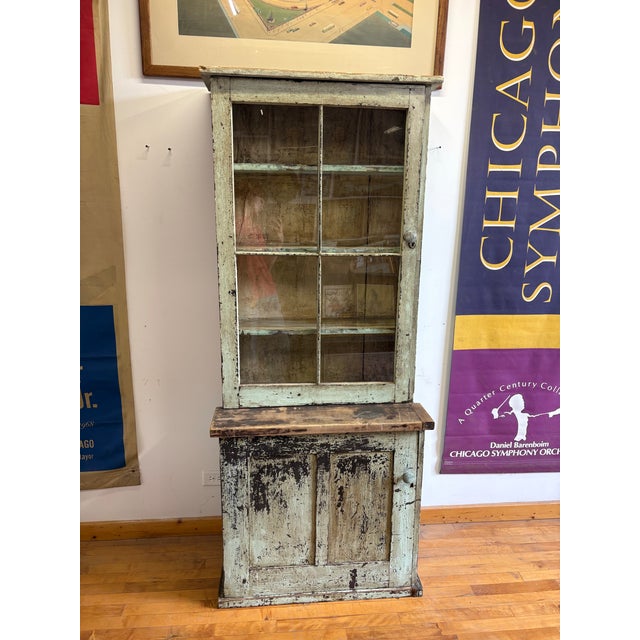This two-piece stepback cupboard has that crusty authentic patina we’re obsessed with right now. Heavily textured with an...