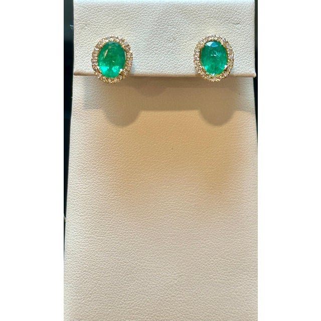 Gemstone 6 Carat Oval Shape Emerald and Diamond Post Back Earrings 14 Karat Yellow Gold For Sale - Image 7 of 18