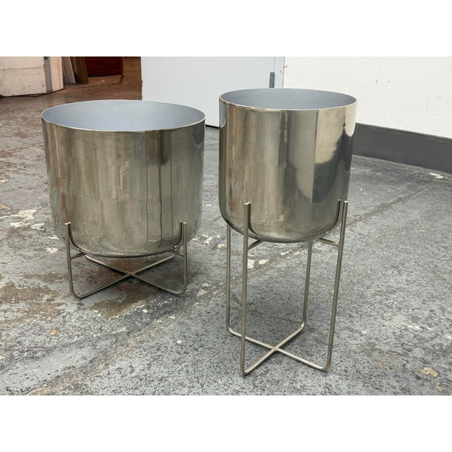 Design Plus Gallery presents a Set of Two Charm Planters from West Elm. This matching set includes two round metal...