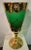 Murano Glass, green glass with gold ornaments and 24 kt enameled floral ornaments. This piece has an attribution mark, I...