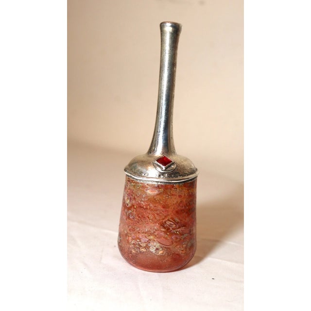 Up for sale is a rare vintage handmade sterling silver and art glass Judaica bottle made by Sherman. The bottle its blown...