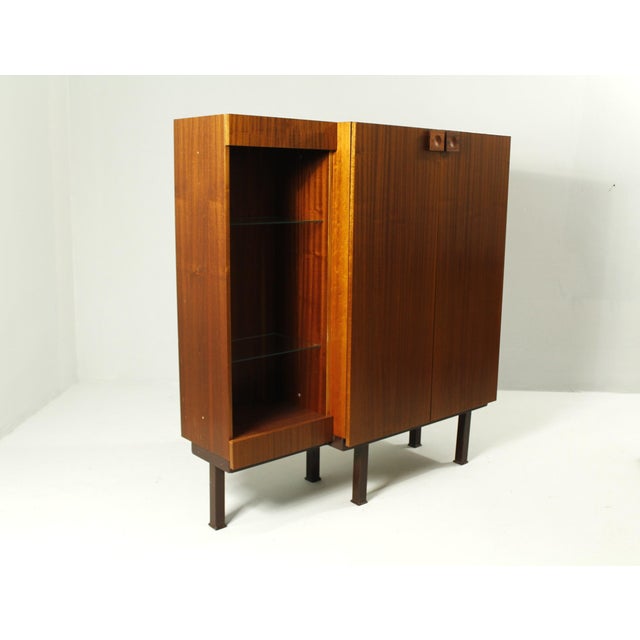 Mahogany dresser with bookcase manufactured by Horácký nábytek, Czech republic, in the 1970s. This piece has been...