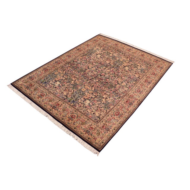 Designed with mesmerizing intricacy and gorgeous color palette, this hand-knotted masterpiece demonstrates the beauty and...