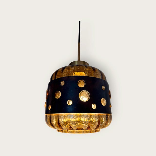 Brutalist pendant lamp by Nanny Still for Raak Amsterdam (1960s). High-quality construction in acid-treated, patinated...