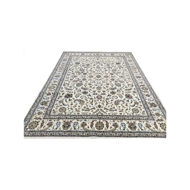 Exact Size: 8'10" x 12'4" Color: Natural Age: New Materials: Wool Construction: Hand Knotted Origin: India