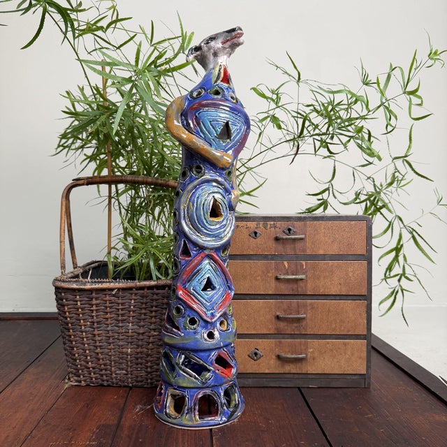A tall and sculptural ceramic object from seminara in calabria, made by gennaro condurso. a handmade and unique piece, of...
