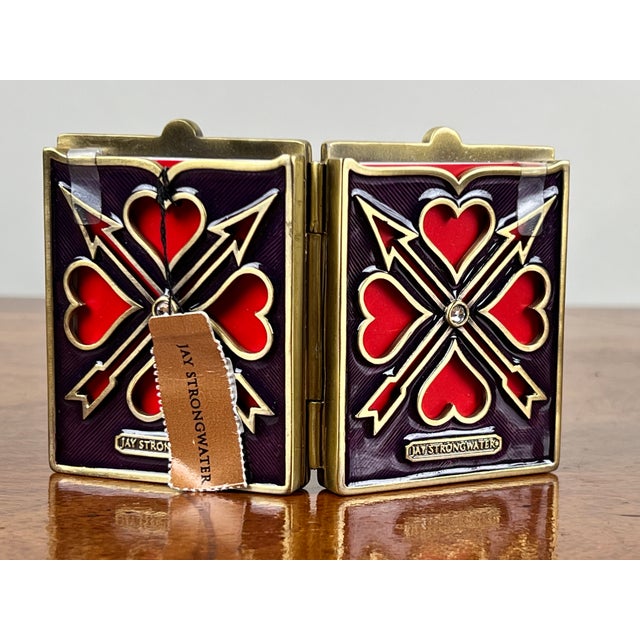 This exquisite double heart picture frame by Jay Strongwater showcases the designer’s signature fusion of jeweled...