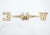 This is a solid brass weathervane directional crossbar, representing the West and East compass cardinal points. The North-...
