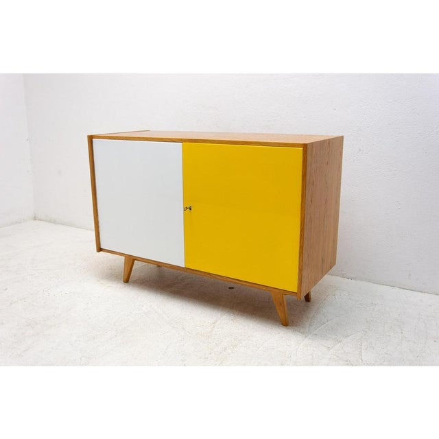 Mid-century sideboard-cabinet, catalogue no. U-450, designed by jiri jiroutek. It´is made of beechwood, veneer, plywood...