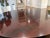 Attributed to Hickory Chair Company Flame Mahogany Round Coffee Table With Brass Sabots For Sale - Image 6 of 12