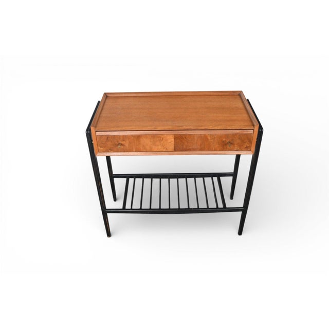 Origin: England Designer: Unknown Manufacturer: Unknown Era: 1960s Materials: Teak, Lacquered Beech Measurements: 30.5″...
