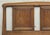 Mid Century Modern wooden twin size headboard. It features two inset panels and a slight tapering in the design, giving...