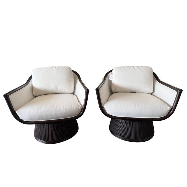 Elevate your seating experience with the Palecek Baldwin Swivel Chair, where timeless design meets effortless comfort....