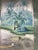 Beautiful hand‑painted panoramic mural featuring charming vintage tropical riverside scenery. This detailed artwork...