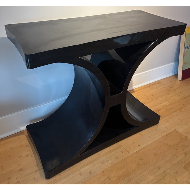 A chic Karl Springer "JMF" style console table in a black crackle lacquer finish. Perfect for an entry hall or sofa table