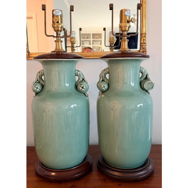 Lovely vintage Ralph Lauren Chinese celadon ceramic table lamps with a crackle underglaze and applied fruit handles on...