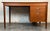 This Mid-Century Danish writing desk by Arne Vodder for Sibast features an adjustable floating drawer cabinet, allowing...