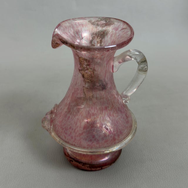 A refined jug-shaped pouring vessel in fine artistic glass, original from the historic murano glassworks v. Nason & c.,...