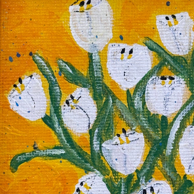 Charming original floral still life painting featuring white tulips arranged in a deep brown vase against a vibrant golden...