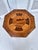 A 20th century Italian side or drinks table, the octagonal shaped top with inlaid woods creating a landscape with...