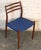 The model 78 chair by Niels Otto Moller is a beautiful example of mid-century Danish design. Teak wood frame with blue...
