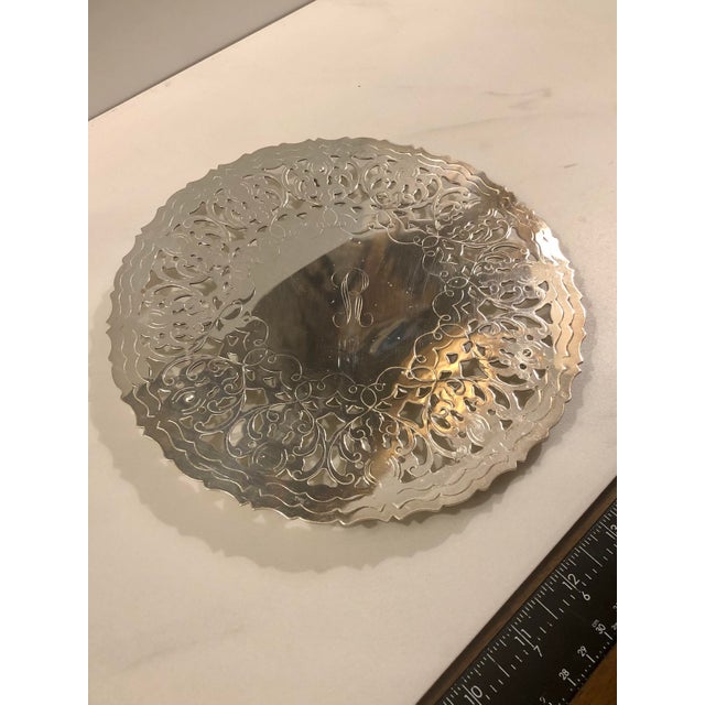 This beautiful vintage 1960s Italian Pierced Silverplate Trivet “R” Monogram will be a sophisticated addition to any...